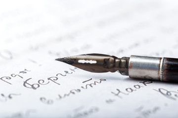 Fototapeta premium Fountain pen on an antique handwritten letter