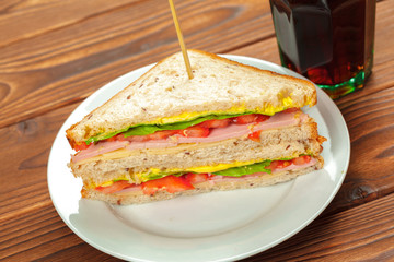 sandwich on a wooden table