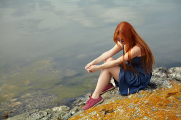 redhead woman in a dress