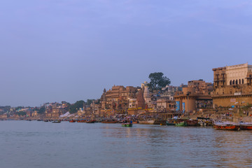 Fototapeta na wymiar Varanasi, Uttar Pradesh, India - October 23, 2017: Ganges river bank in morning, famous and holy place for pilgrims to take baht.