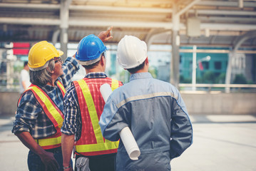 Engineers looking at construction On the BTS station