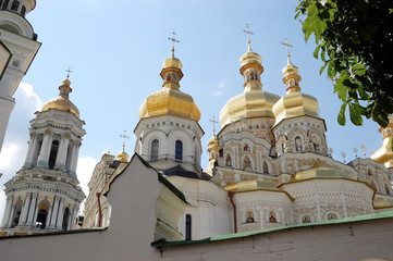 Fototapeta na wymiar View of the golden shining domes of the Kiev-Pechersk Lavra.