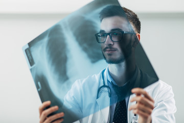 Doctor looking at x-ray