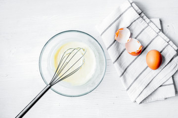 Fototapeta premium cooking pancake on white background top view ingredients for mak