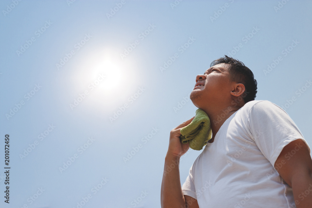 Wall mural Young man and heat stroke.