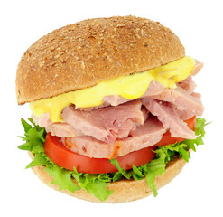 Ham and salad sandwich roll with mayonnaise isolated on a white background
