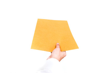 businessman hand holding brown envelope on white background