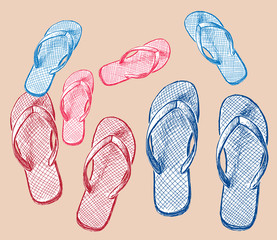 Beach slippers of one family on the seashore