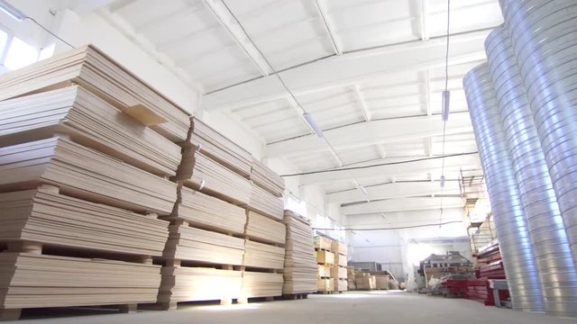 large commercial warehouse with plywood