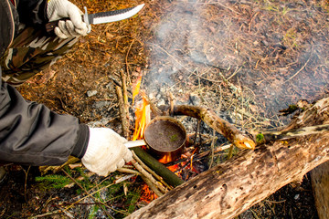Making tea at the stake during a hike
