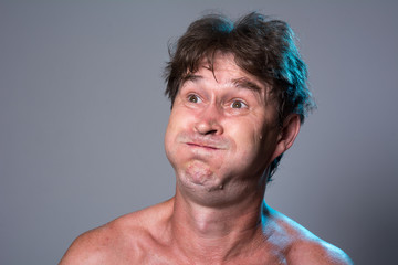 Obraz premium Close-up portrait of a man with pouting cracks