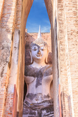 Fototapeta na wymiar Big Buddha in chapel at Wat Si Chum , Shukhothai Historical Park, Thailand