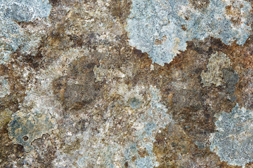 .Textured color spots on an ancient stone. Background.