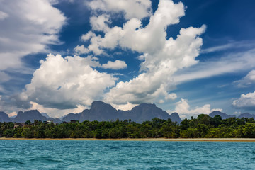Coastline of Krabi island with clouds in high winds, Thailand