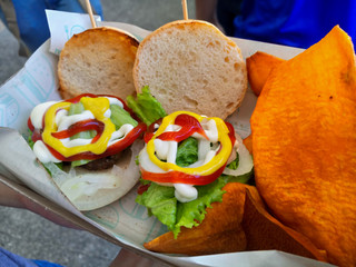 Small hamburgers with baked sweet potatoes