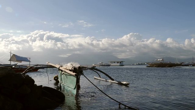 Baywalk vieuw over port with boats of Puerto Princesa