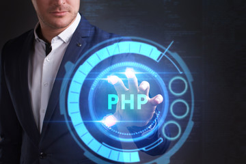 Business, Technology, Internet and network concept. Young businessman working on a virtual screen of the future and sees the inscription: PHP