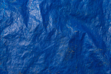 Background texture of blue plastic tarp - obrazy, fototapety, plakaty
