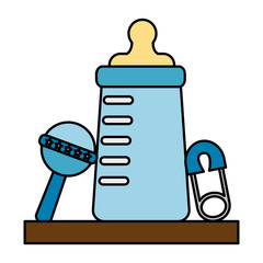 baby milk bottle with jingle bell and clothes pin vector illustration design