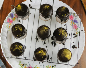 Chocolate mousse dessert, gold powder dusted