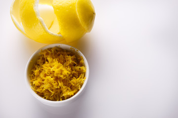 Lemon and juice on a white background