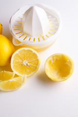 Lemon and juice on a white background
