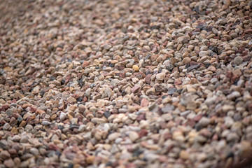 Large piles of construction sand and gravel used for asphalt production and building. Limestone quarry, mining rocks and stones