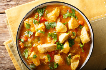 Brazilian traditional Bobo chicken with vegetables in coconut milk close-up. horizontal top view © FomaA