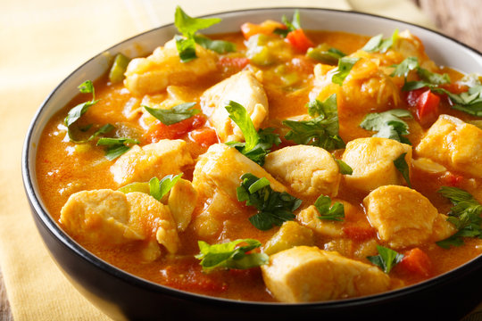 South American Food: Bobo chicken stew with vegetables in coconut milk close-up. horizontal