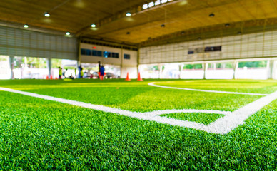 Fototapeta na wymiar Corner kick spot in an indoor soccer field