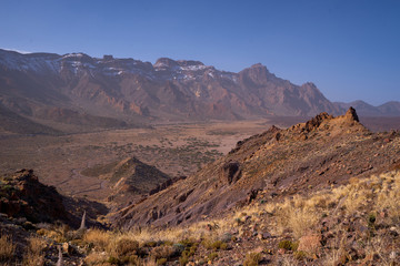 The beautiful view to volcanic lava and sandstone with grass on the Teide Volcano