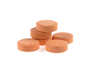 vitamin c in tablets on white background