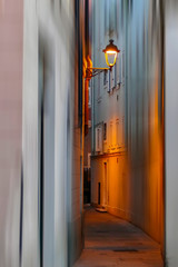 View at dusk time with one small street in Trieste, Italy