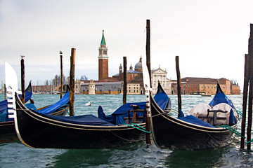 Fototapeta premium Gondolas mooring line in front of San Marco Plaza. Venice, Italy