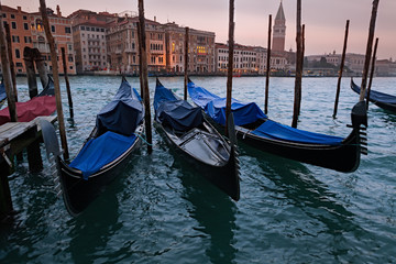 Fototapeta na wymiar Gondolas mooring line in front of San Marco Plaza. Venice, Italy
