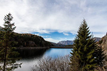 A Sensational Mountain Landscape With A Lake Formed By A Dam