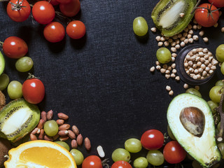 organic natural fresh superfood fruit seed and nuts on dark background copy space