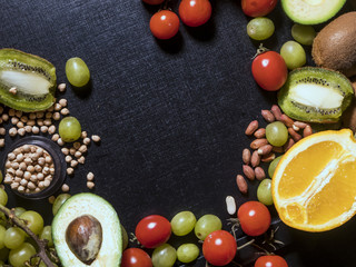 Naklejka na ściany i meble organic natural fresh superfood fruit seed and nuts on dark background copy space