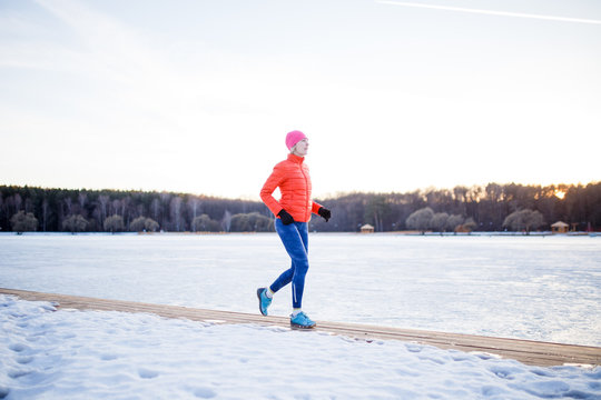 Image of sports girl on morning exercise in winter