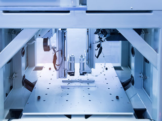 Robotic arm at production line in factory