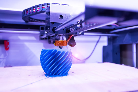 3D printer printing figure close-up macro
