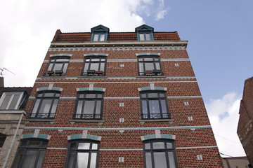 Fototapeta na wymiar Immeuble en briques à Lille, Nord