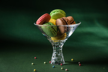 Delicious assorted macarons in martini glass - Powered by Adobe