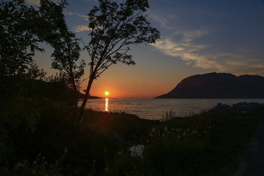 Sunset by the sea in Velfjord and moountain Andalshatten Northern Norway