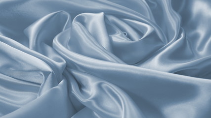 smooth blue satin. abstract folds. silk background.