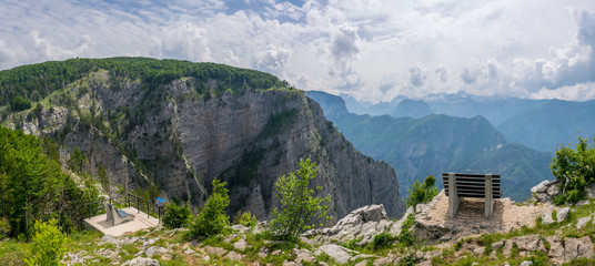 A picturesque bench for meditation is on top of a cliff.