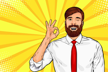 Hipster beard male businessman winks and shows okay or OK gesture. Pop art retro vector illustration. Success concept. Invitation poster.