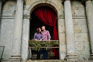 Fototapeta na wymiar Stylish couple wear on checkered shirt in love together.