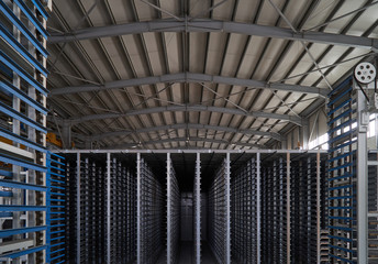 Large warehouse hangar of factory interior. Industry manufacturing concept