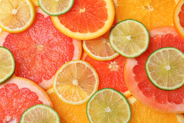 Fototapeta na wymiar Many fresh yummy citrus slices